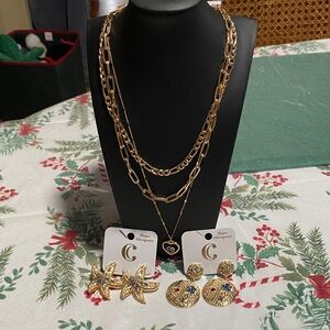 All jewelry b1g1 1/2 off Charming Charlie Gold Layered Necklace with Heart Pend